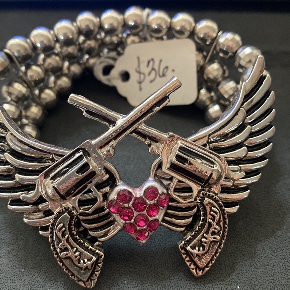 Stretch bracelet guns and wings with a heart in the middle - Picture 2 of 3